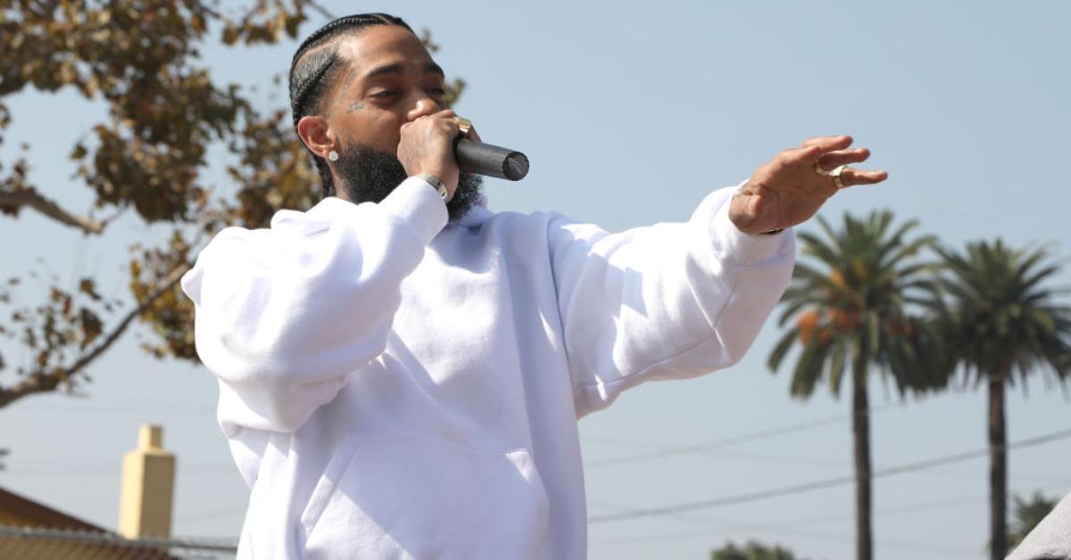 Nipsey Hussle speaks to kids at the Nipsey Hussle x PUMA Hoops Basketball Court Refurbishment Reveal Event on Oct. 22, 2018 in Los Angeles, California.