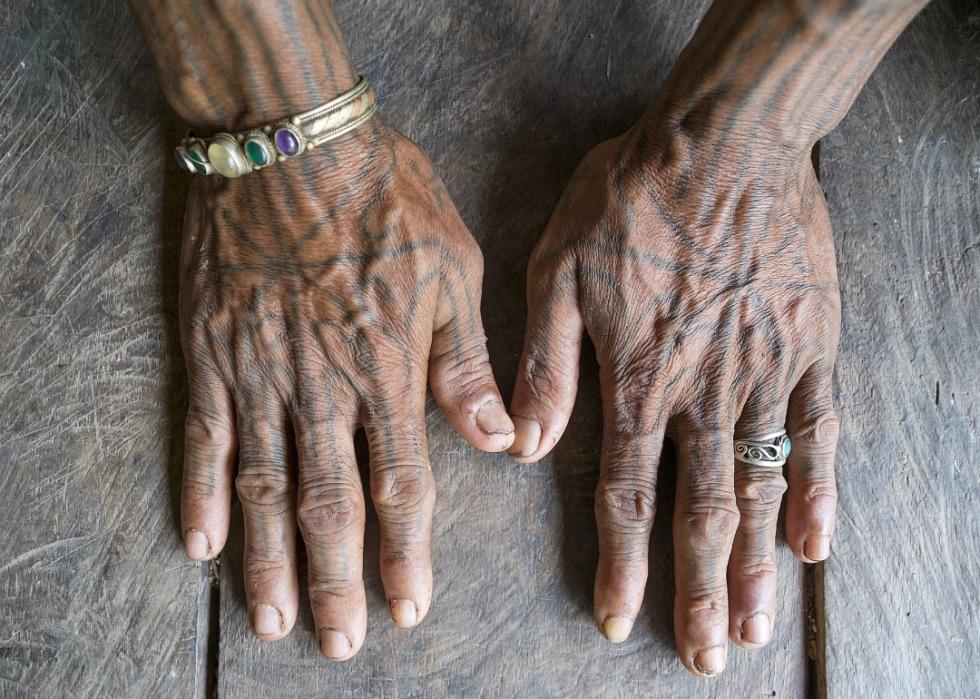 tattooed hands