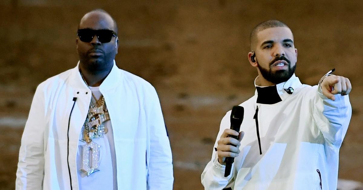 Travis "Baka" Savoury (L) and recording artist Drake get ready to perform during the 2017 Billboard Music Awards 