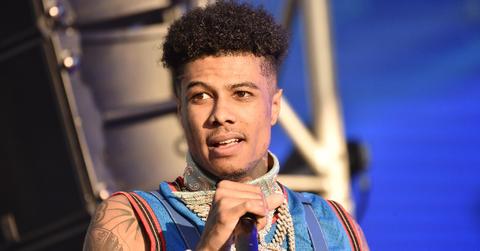 Blueface preforming looking into the crowd.