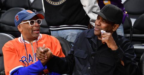 Spike Lee and Denzel Washington attend a basketball game between the Los Angeles Lakers and the New York Knicks at Crypto.com Arena