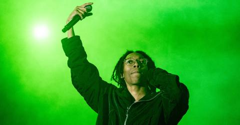 Lil Tecca performs holding a microphone and wearing a black hoodie during 2023 Rolling Loud Los Angeles at Hollywood Park Grounds on March 05, 2023 in Inglewood, California.