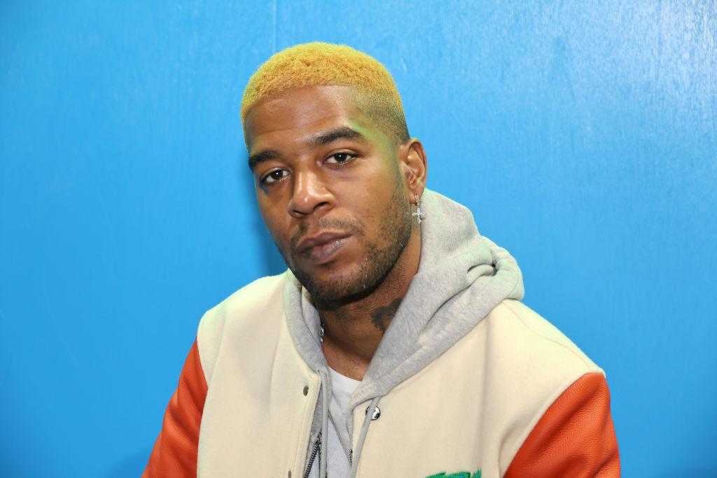 gettyimages kid cudi blonde hair grey jacket