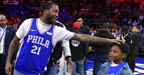 Entertainer Meek Mill stands with his son Papi at halftime during the game between the Miami Heat and Philadelphia 76ers at Wells Fargo Center on April 24, 2018 in Philadelphia, Pennsylvania.