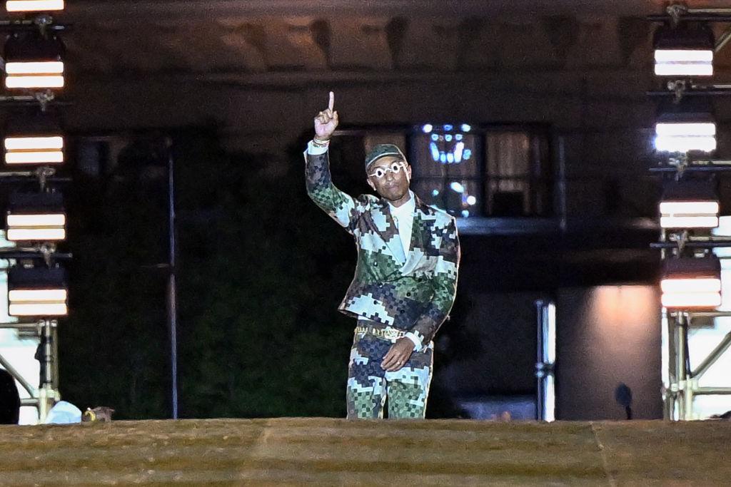 Pharrell Williams walks the runway during the Louis Vuitton Menswear Spring/Summer 2024 show as part of Paris Fashion Week                 