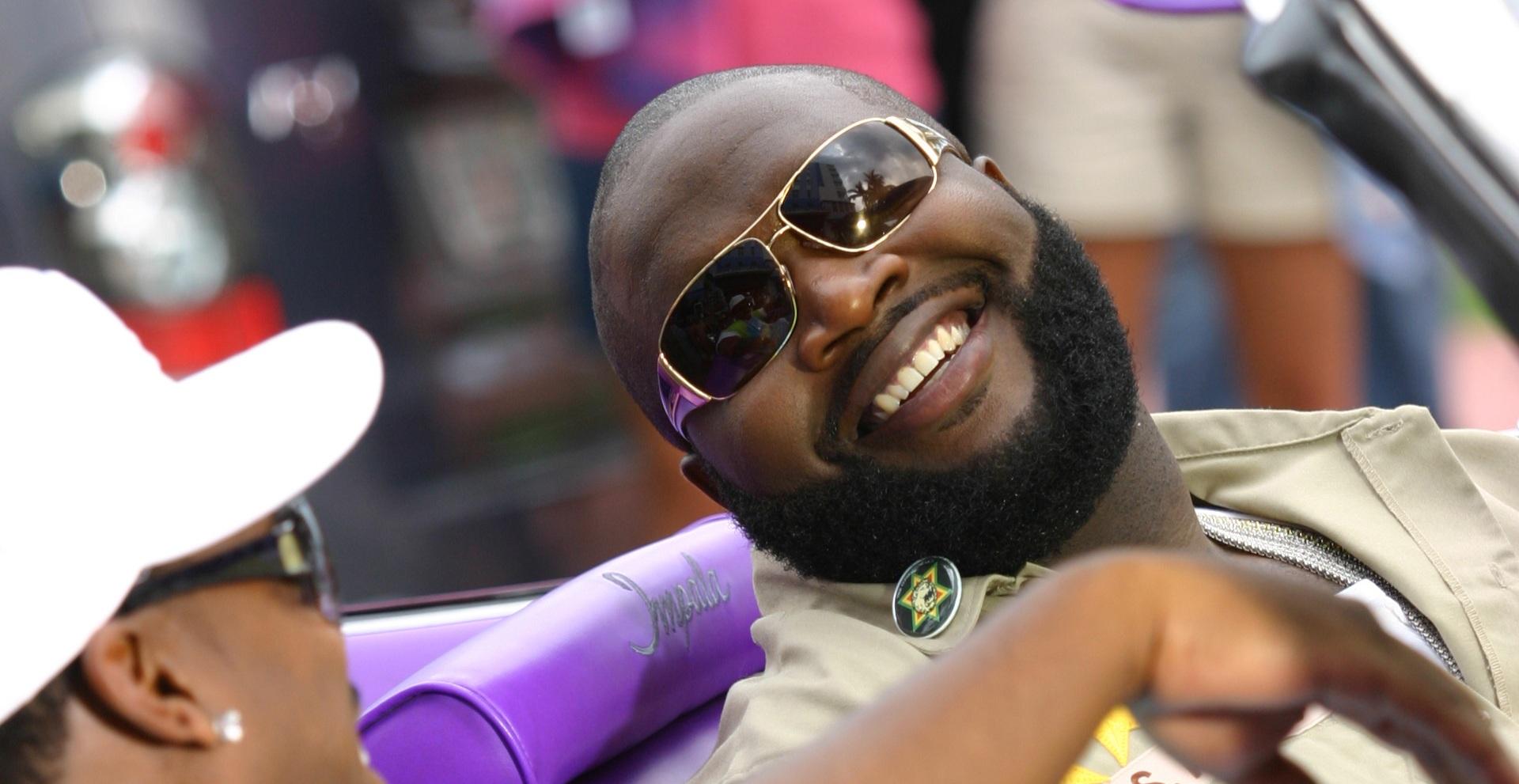 rapper daz and rick ross in car outside hotel during a daz video shoot