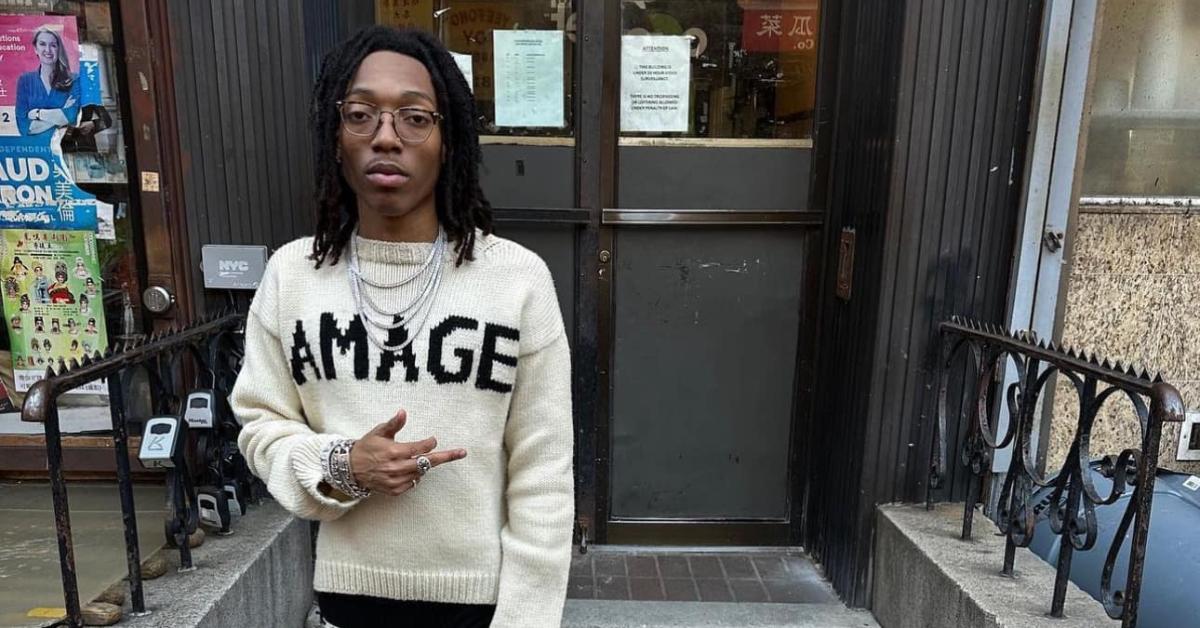 Lil Tecca outside in Enfants Riches Déprimés sweatshirt