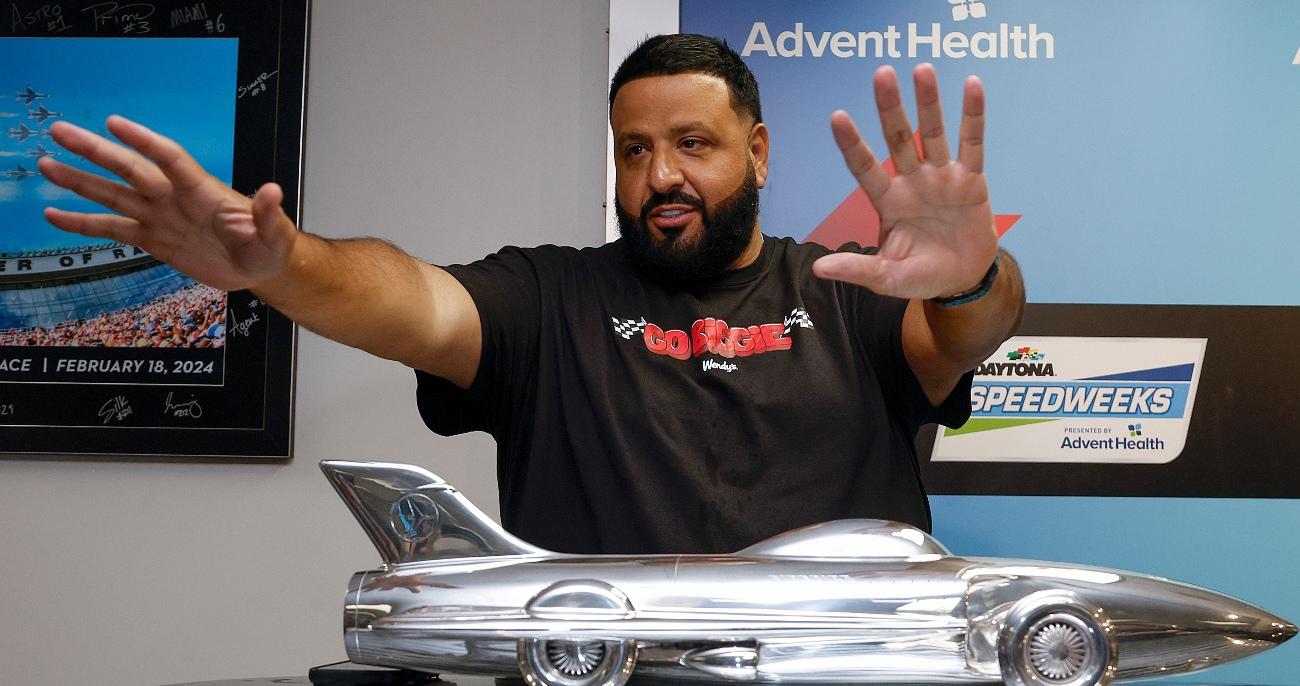 dj khaled poses with the harley j earl trophy