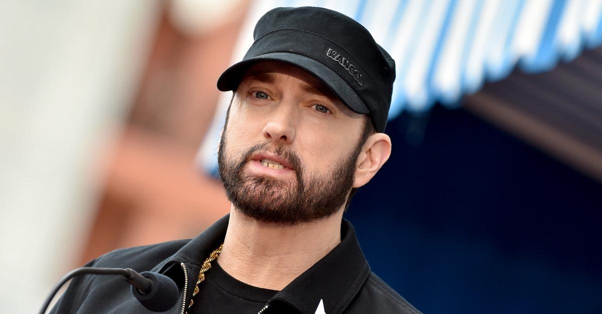 eminem with beard at hollywood walk of fame wearing black capcalifornia