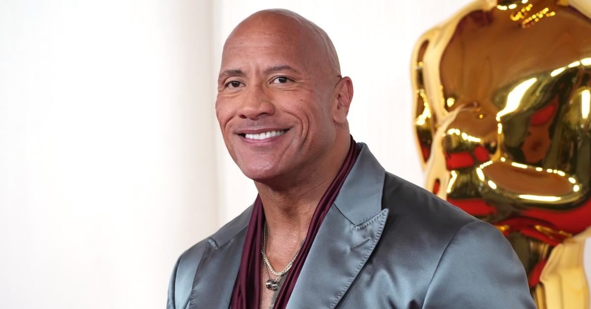 The Rock attends 96th Annual Oscars.