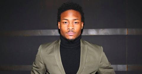 Stephon Diggs wears an olive green suit.