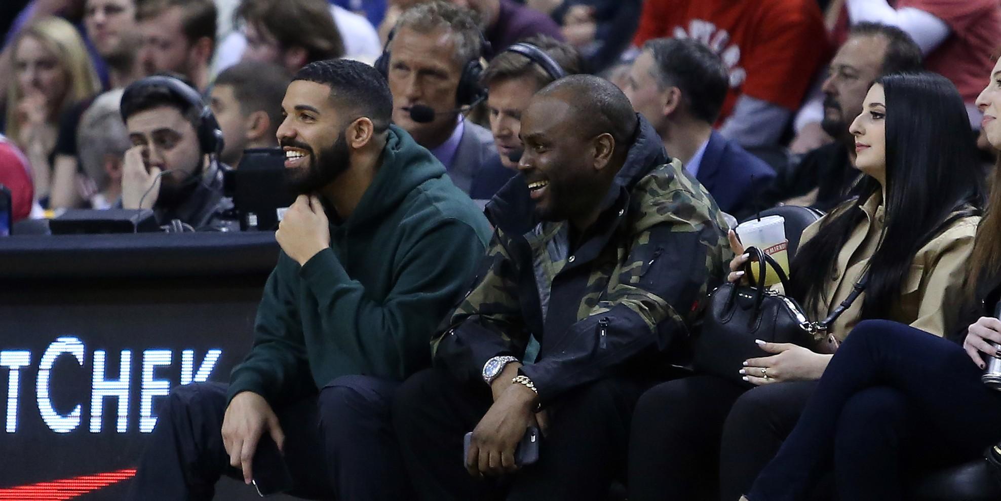 drake and baka not nice react during the first half of an nba game between the indiana pacers and t