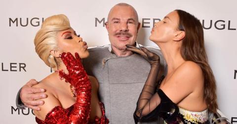 Thierry Mugler poses with Cardi B and another model.