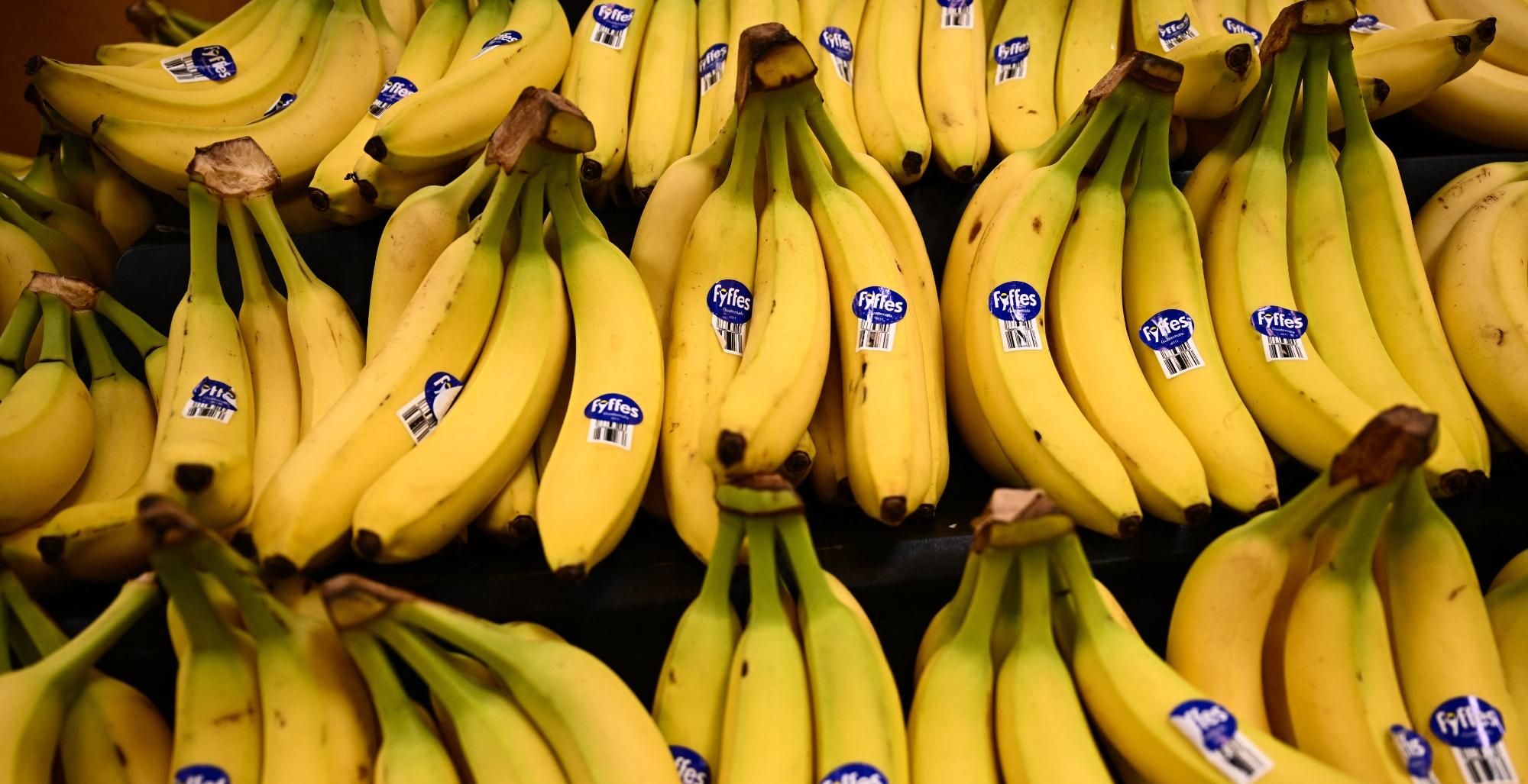 bananas are displayed for sale in the fresh produce area of a sprouts farmers