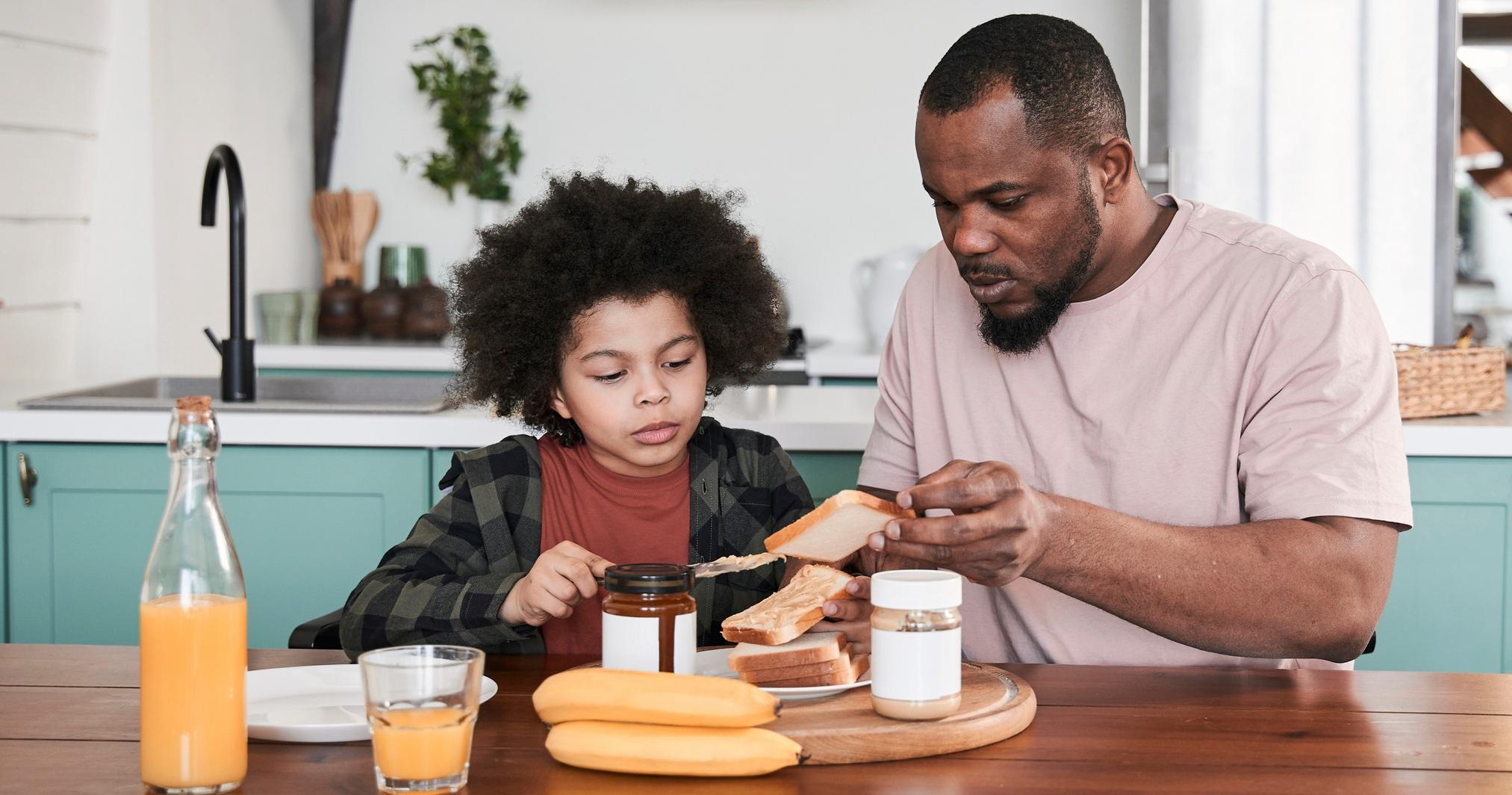 father preparing toasts for his son