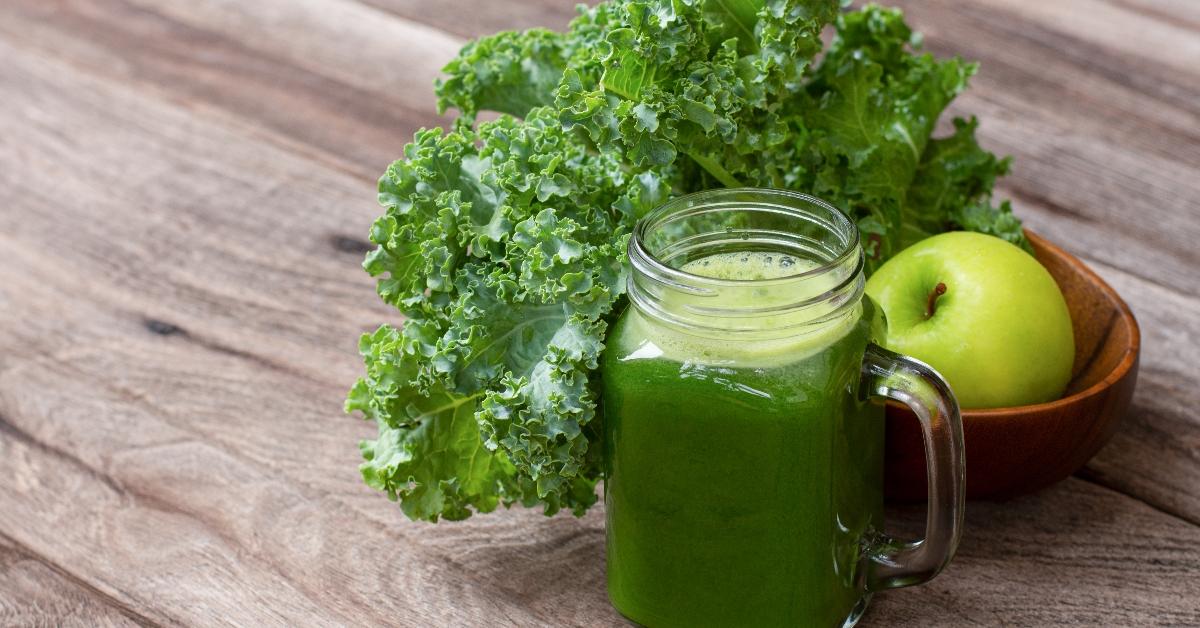 healthy green smoothie kale juice on wood table