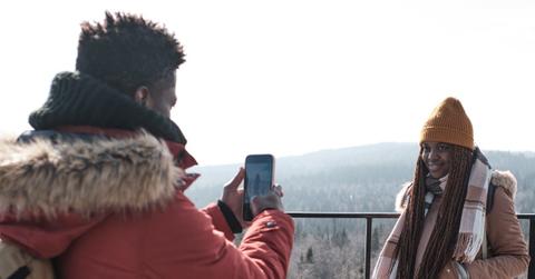 Black woman getting her photo taken