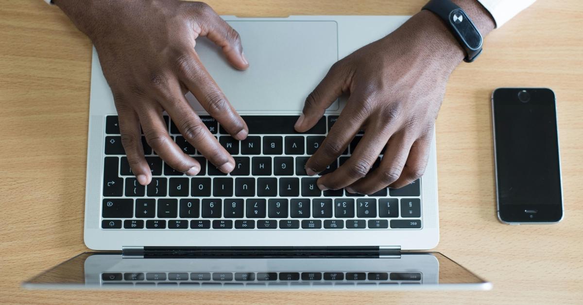 black man on a laptop