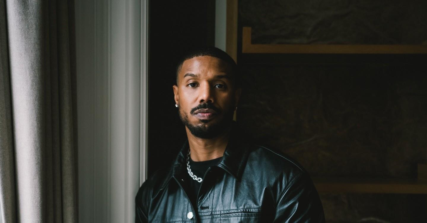 Michael B. Jordan wears a black jacket