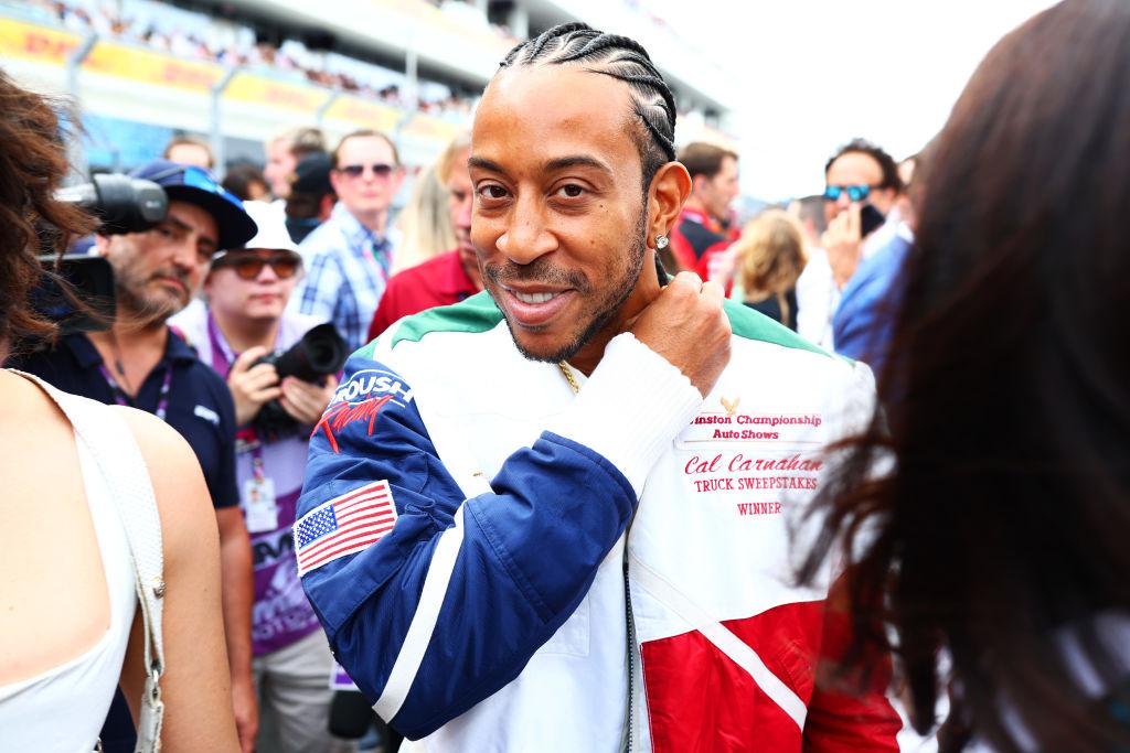  Ludacris looks on from the grid prior to the F1 Grand Prix of Miami at Miami International Autodrome 