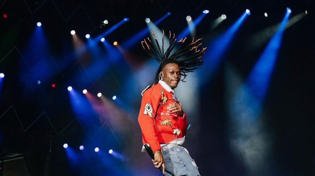 Still shot of Fireboy DML performing at Afro Nation.