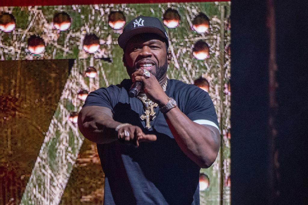 50 Cent performs onstage during 'The Final Lap Tour' at Pine Knob Music Theatre