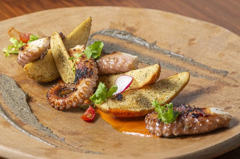 wp content/uploads///Octopus dish courtesy of Angustina Mezcal Cocina