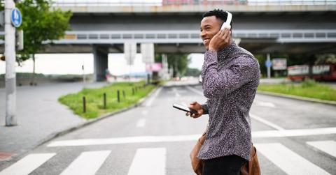 Young black man is commuting in the city.