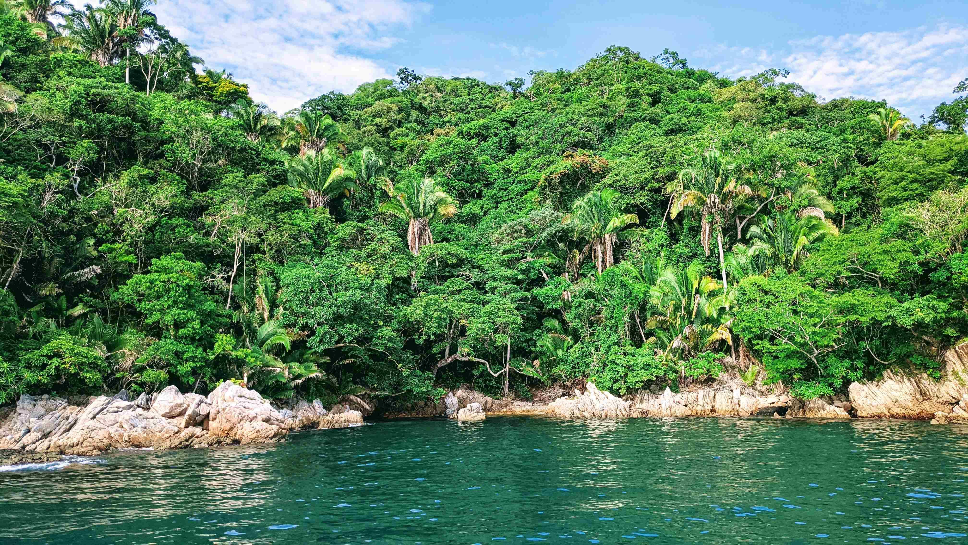 heading to majahuitas beach by boat