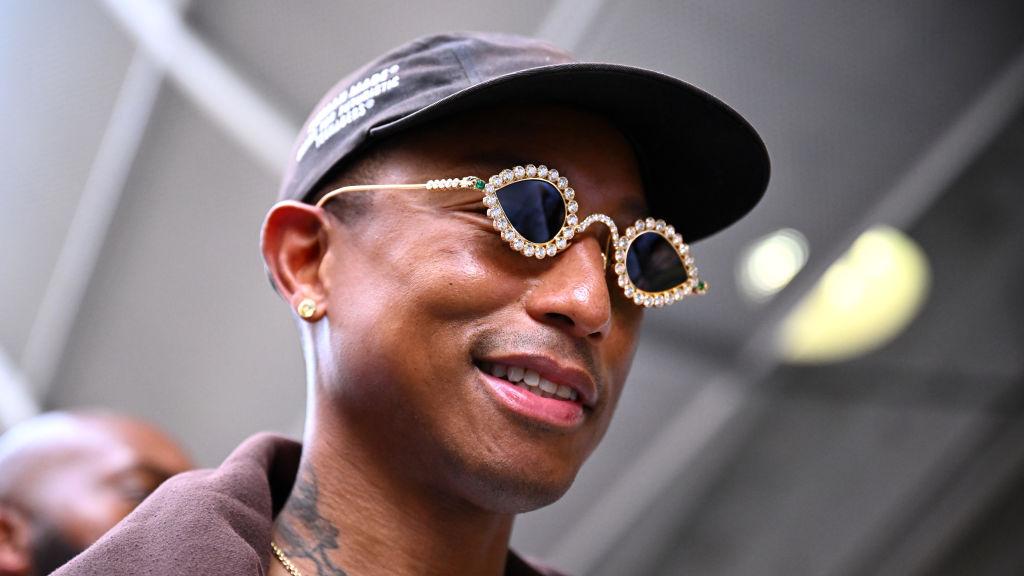 Pharrell Williams looks on in the Paddock prior to the F1 Grand Prix of Miami at the Miami International Autodrome