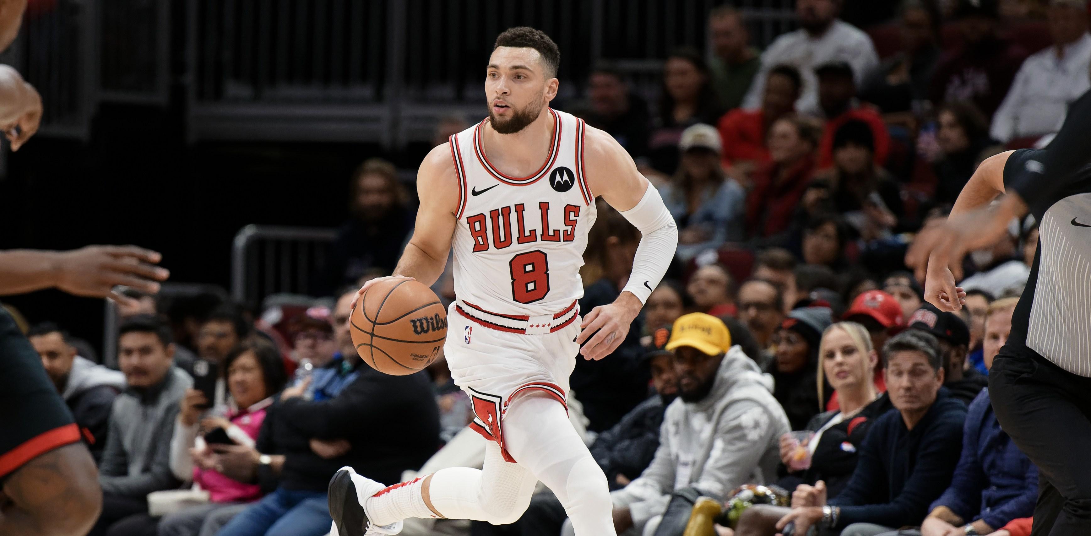 zach lavine  of the chicago bulls controls the ball against the houston rockets