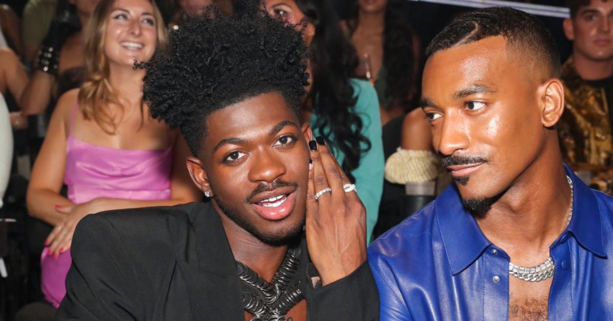 Lil Nas X (L) and Sean Bankhead at the 2022 MTV VMAs at Prudential Center on August 28, 2022 in Newark, New Jersey.