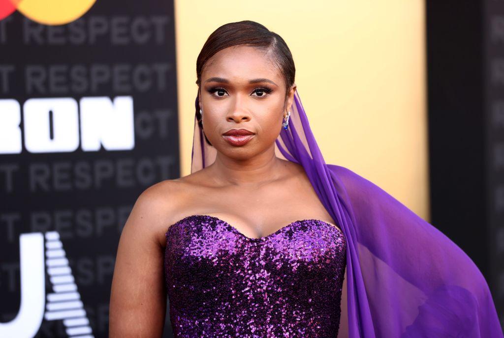 Jennifer Hudson wears a purple sequined strapless dress and attends the premiere of MGM's "Respect" at Regency Village Theatre