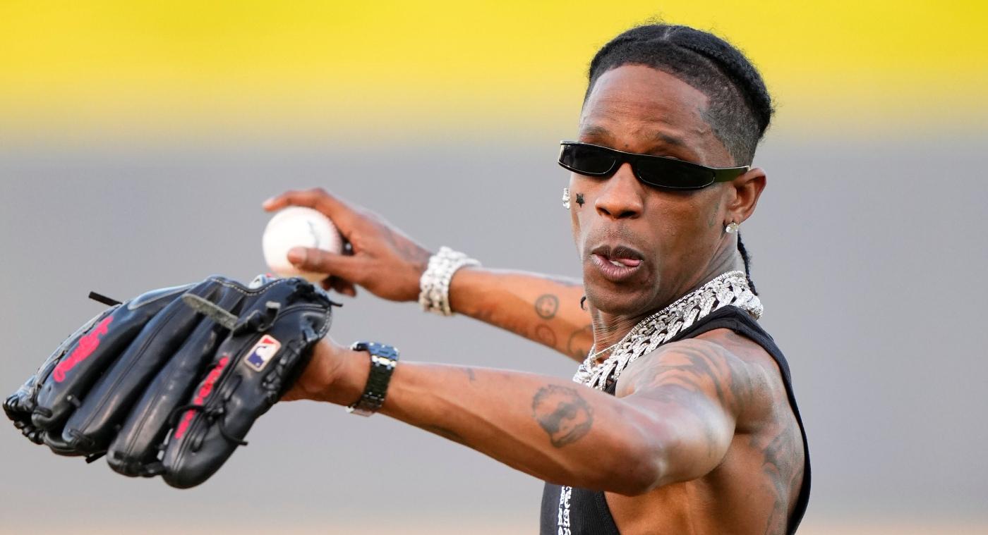 travis scott throws the opening pitch prior to a game between the washington nationals