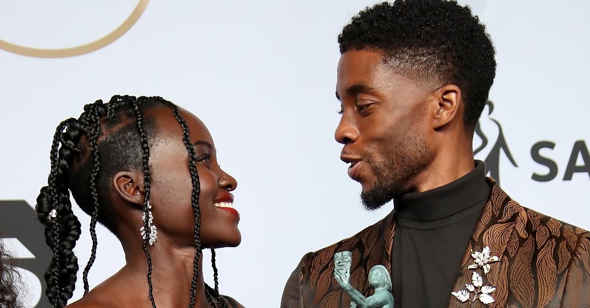 lupita nyongo and chadwick boseman winners of outstanding performance by a cast in a motion pictur