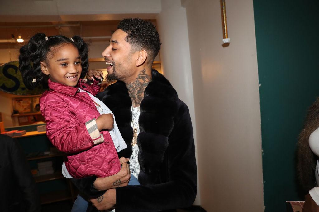  PnB Rock (R) and his daughter backstage at S.O.B.'s on February 14, 2017 in New York City. 