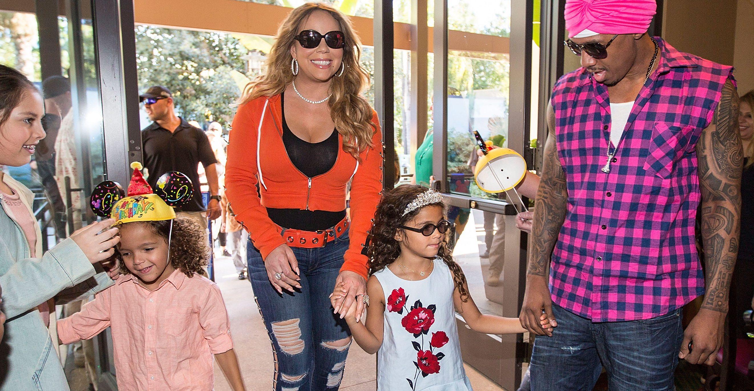 mariah carey l and nick cannon arrive at their childrens birthday party at disneyland on april