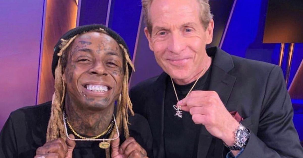 Lil Wayne and NFL commentator Skip Bayless pose for a photo together