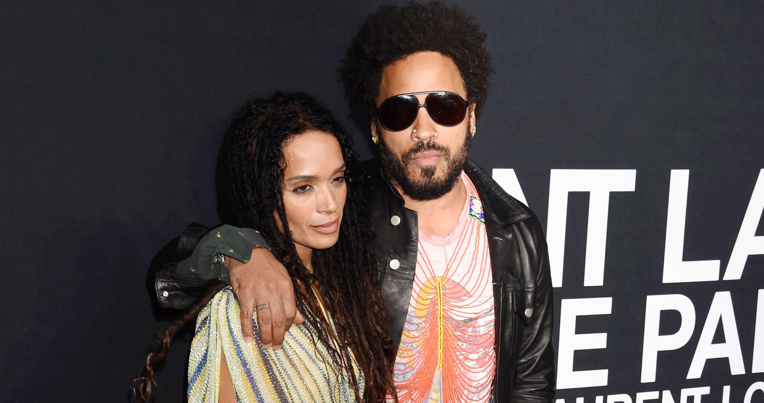 actress lisa bonet l and musician lenny kravitz attend the saint laurent show