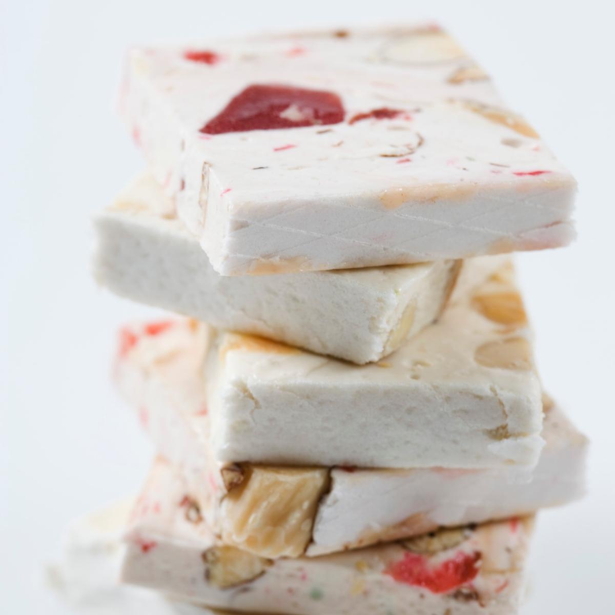 Frozen yogurt bark is sliced and stacked. 