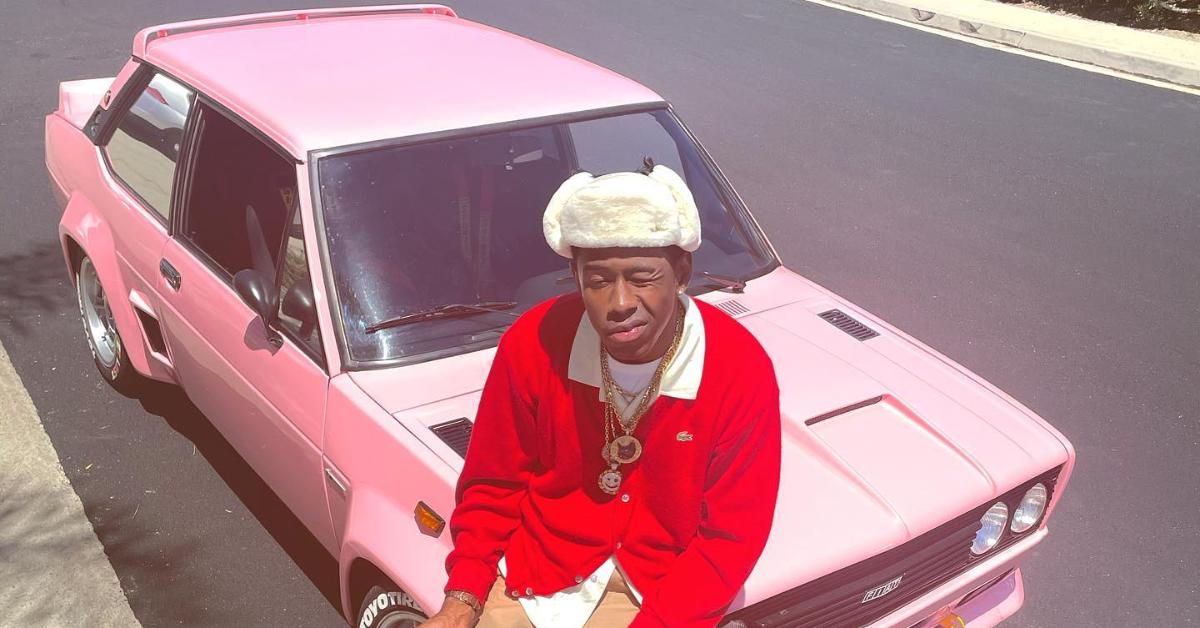 tyler in red lacoste sweater w pink fiat abarth