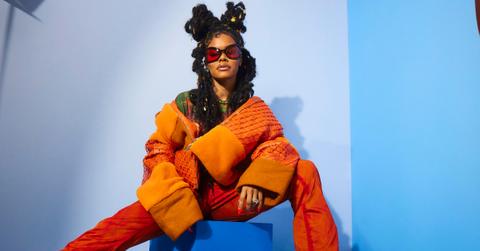 Teyana Taylor visits the IMDb Portrait Studio wearing orange sweater and pants at Acura Festival Village on Location at Sundance 2023 on January 23, 2023 in Park City, Utah.