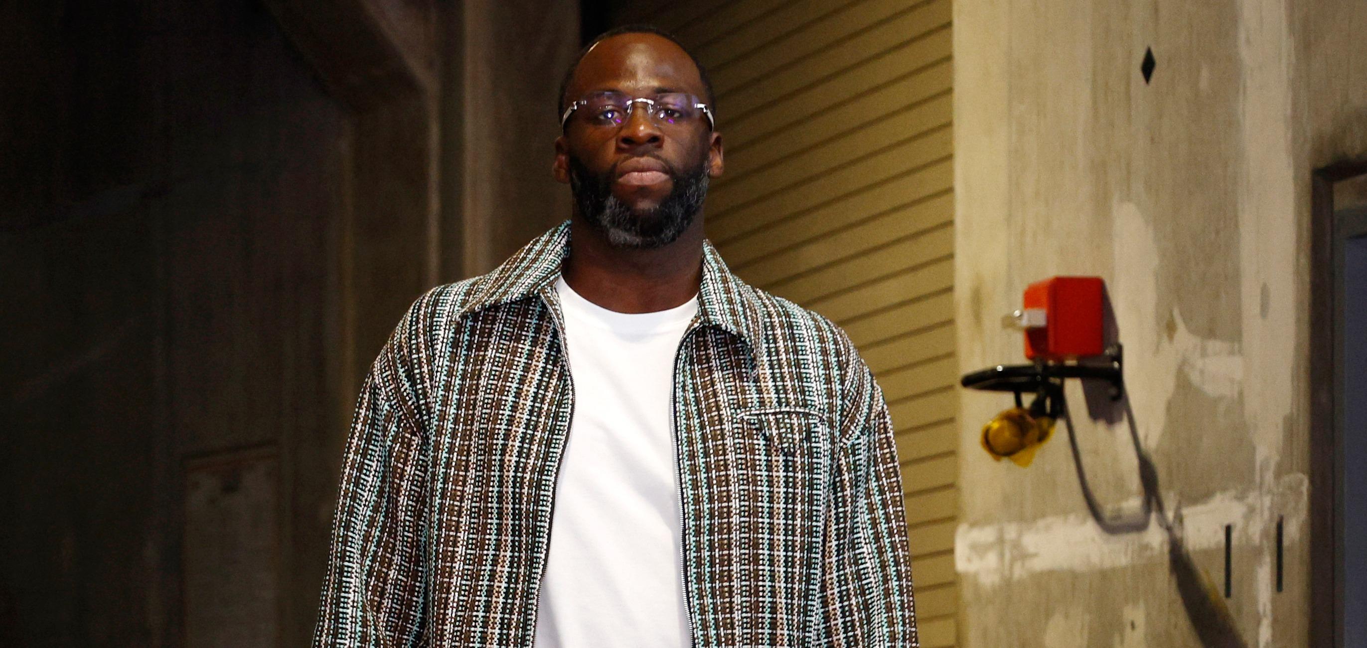 draymond green  of the golden state warriors arrives for a basketball game against the los angele