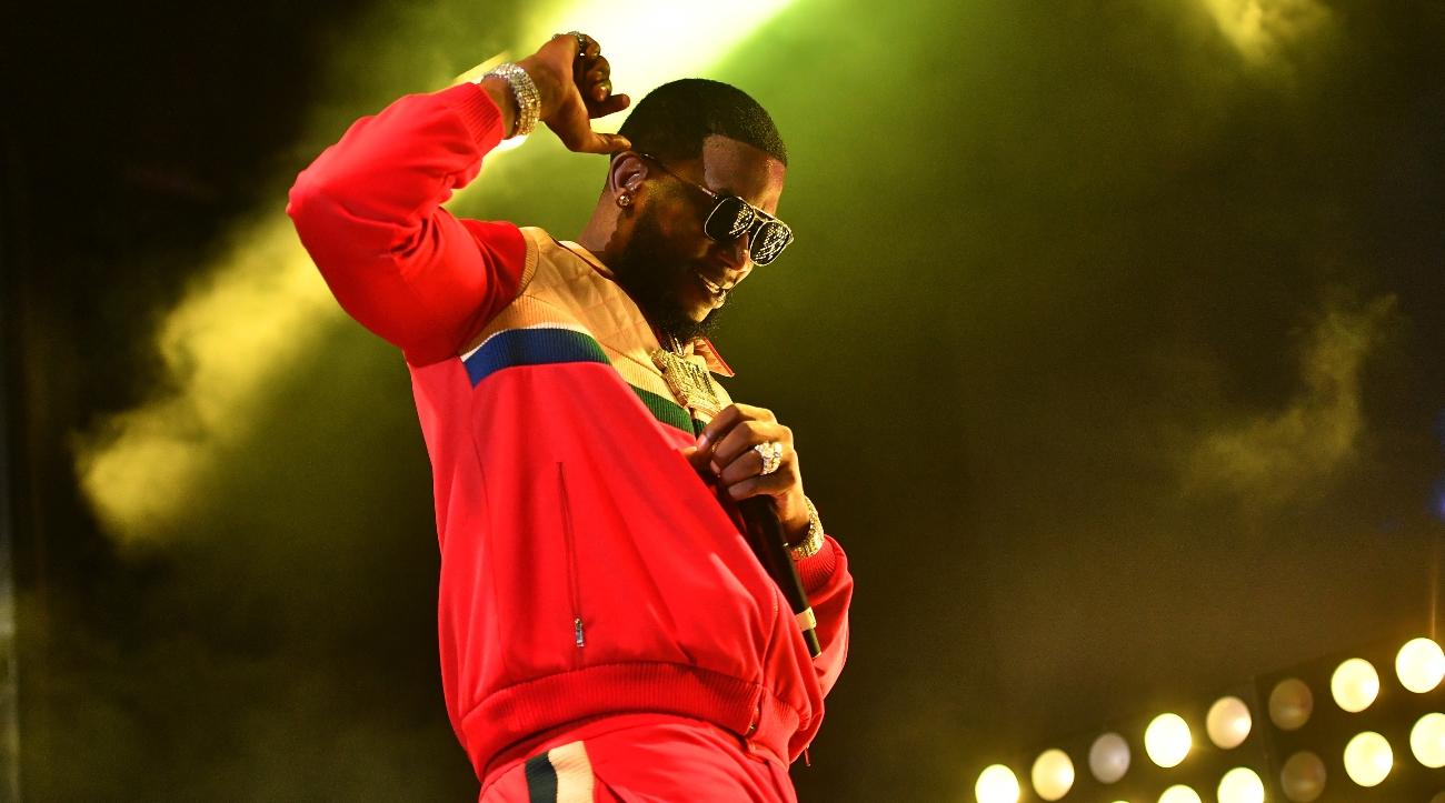 gucci mane performs onstage during parking lot concert series