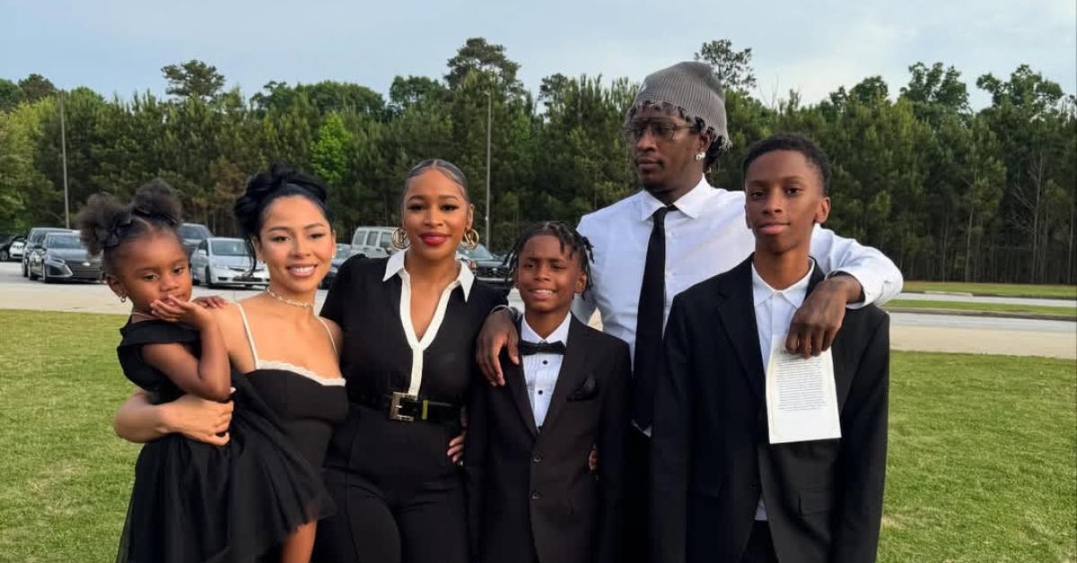 (l-r): Young Thug's daughter, Mariah The Scientist, Young Thug's baby mama, Young Thug's son, Young Thug, and his other son, Jahmir