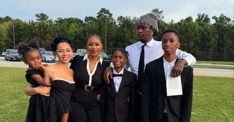 (l-r): Young Thug's daughter, Mariah The Scientist, Young Thug's baby mama, Young Thug's son, Young Thug, and his other son, Jahmir