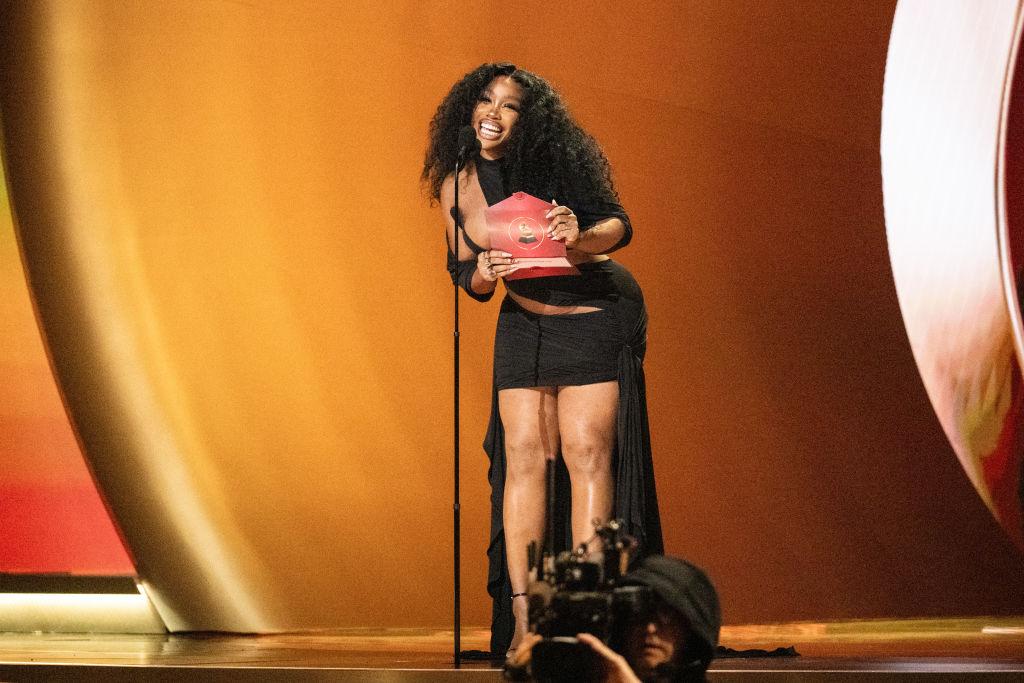 SZA presents the Best Música Urbana Album award during the 65th GRAMMY Awards