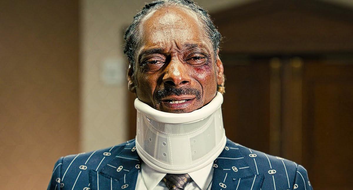 Snoop Dogg in neck brace 