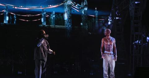 Rapper Snoop Dogg (L) and a hologram of deceased rapper Tupac Shakur perform onstage during day 3 of the 2012 Coachella Valley Music & Arts Festival